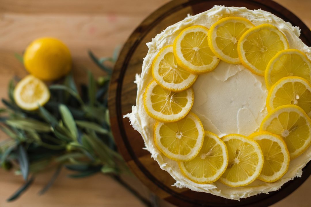 Top view of cake with lemons.
