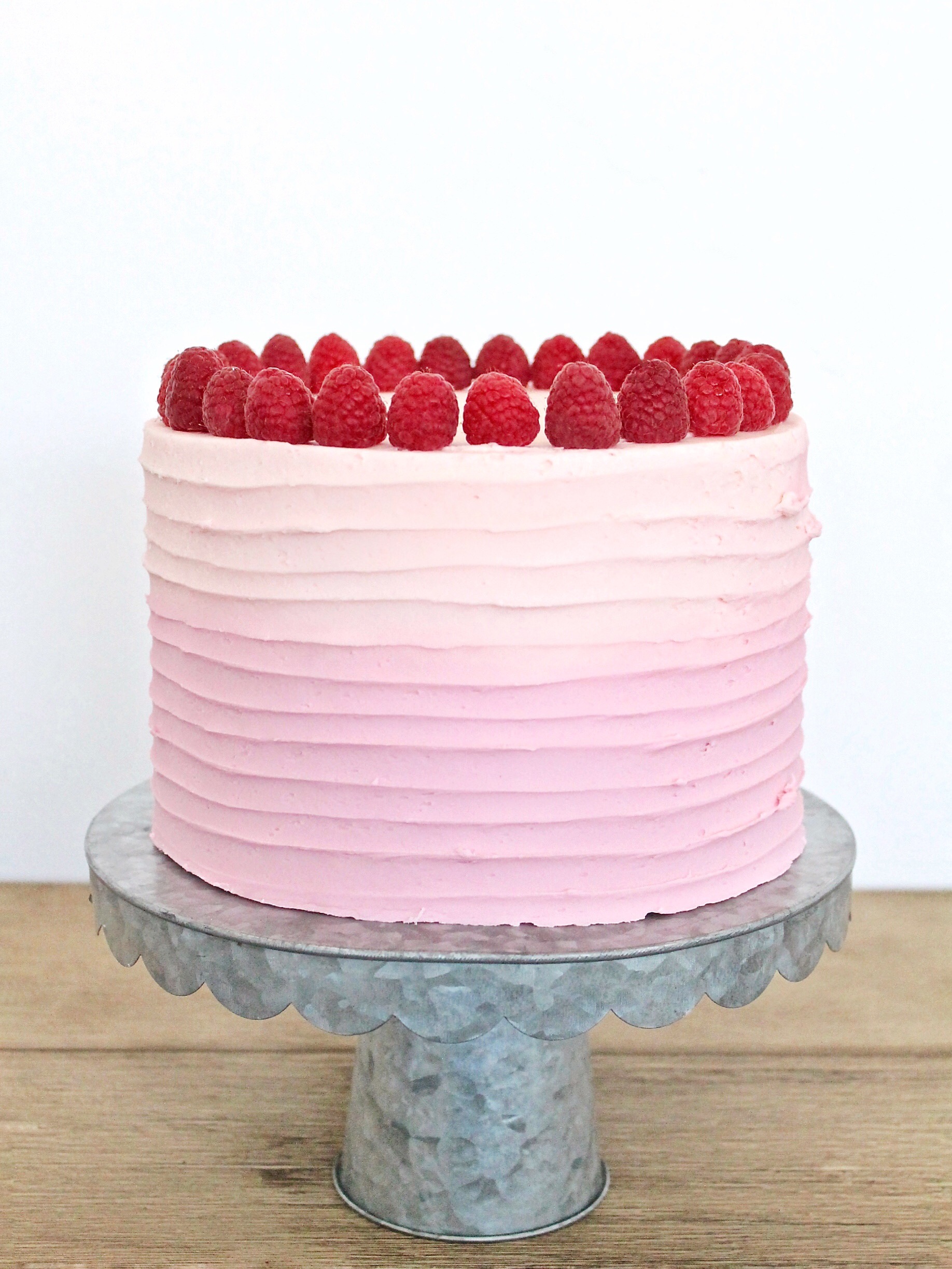 tips to make a pink velvet cake with raspberry buttercream. www.cakebycourtney.com