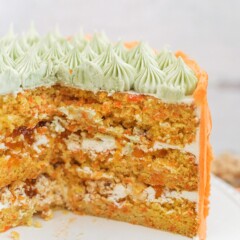 Carrot Apricot Cake - carrot ginger cake layers with white chocolate buttercream, apricot filling and a pretzel crunch #cakebycourtney #carrotcake #whitechocolatebuttercream #cake #eastercake #carrotcakeforeaster #easterdessert