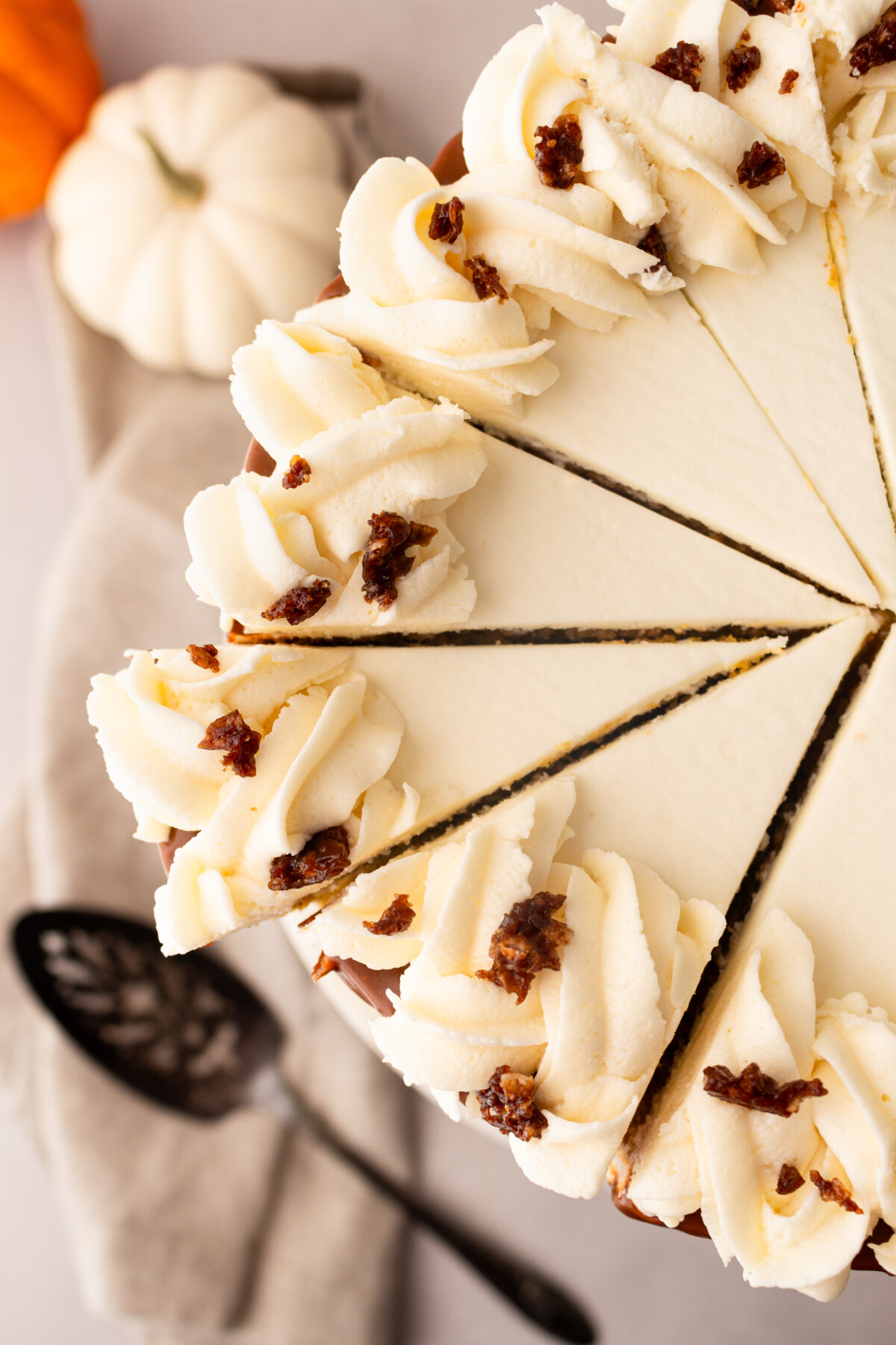 The top of a cake that has slices cut into it. 