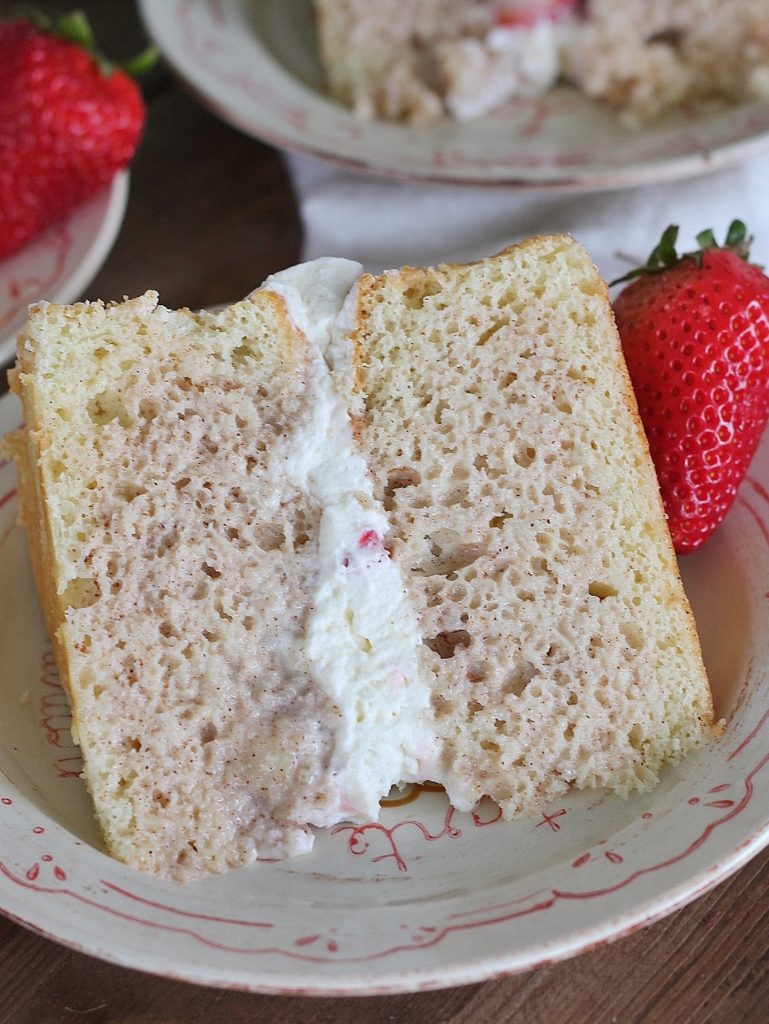 Tres Leches Cake - vanilla sponge cake with a cinnamon soak, whipped cream and fresh strawberries. #cakebycourtney #treslechescake #layeredtreslechescake #cincodemayocake #cincodemayo 