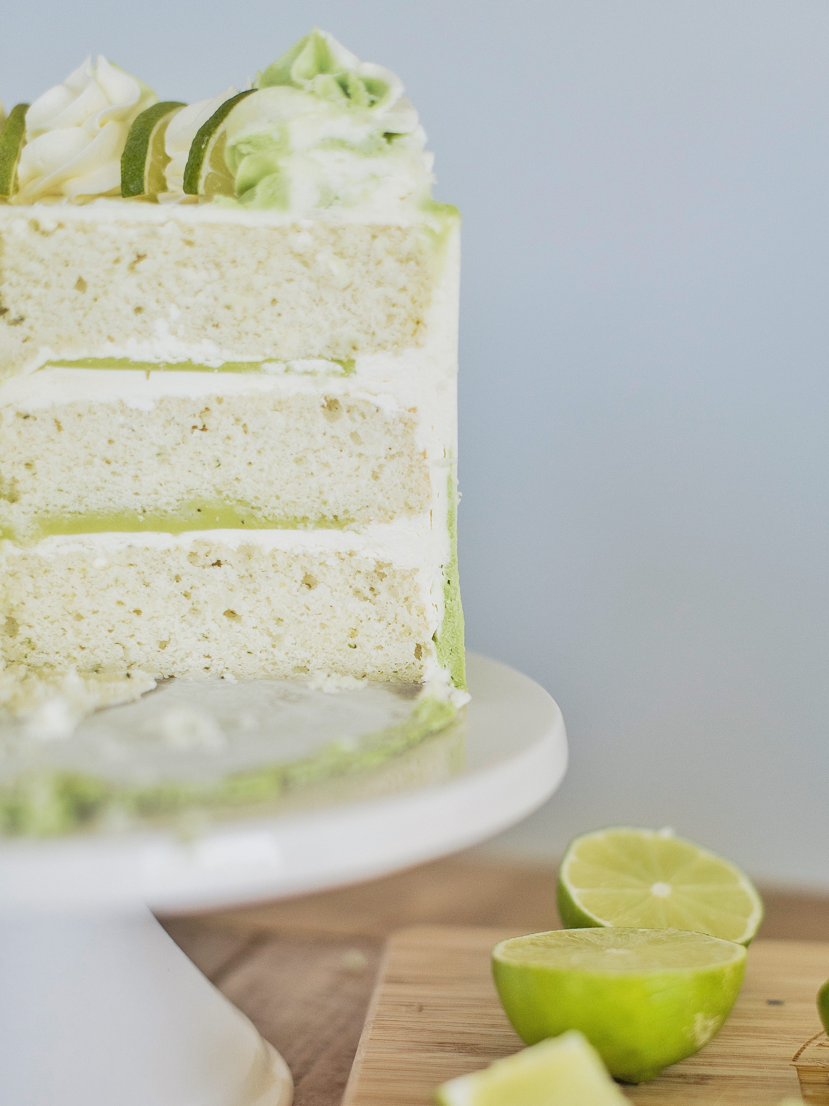 Mojito Cake: tender and fluffy white cake layers infused with lime and mint, with a lime curd and mint buttercream. #cakebycourtney #mojitocake #summercake #cake #cakerecipe #easycakerecipe #mojito