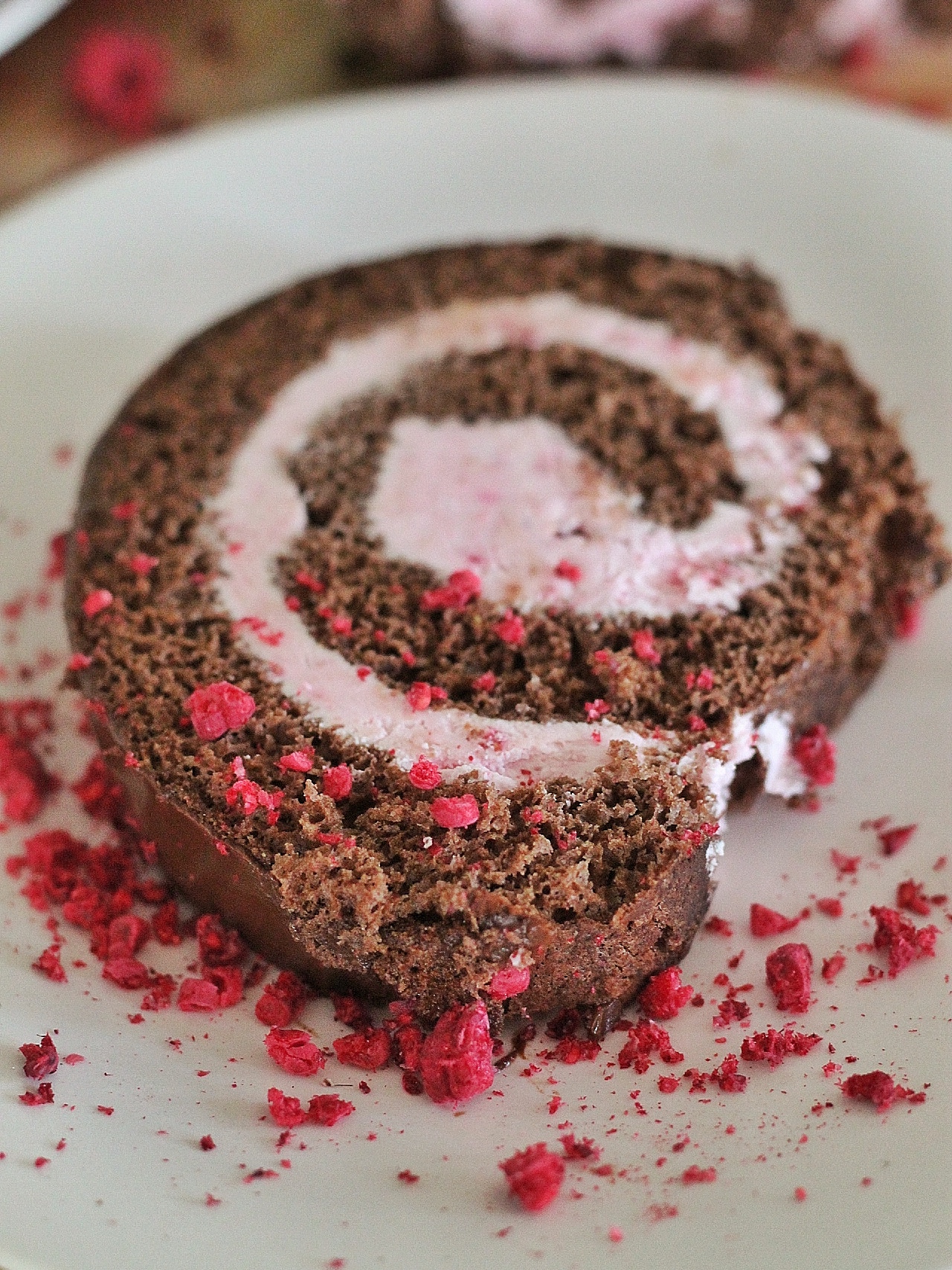 delicious recipe for a chocolate swiss roll with raspberry filling. www.cakebycourtney.com