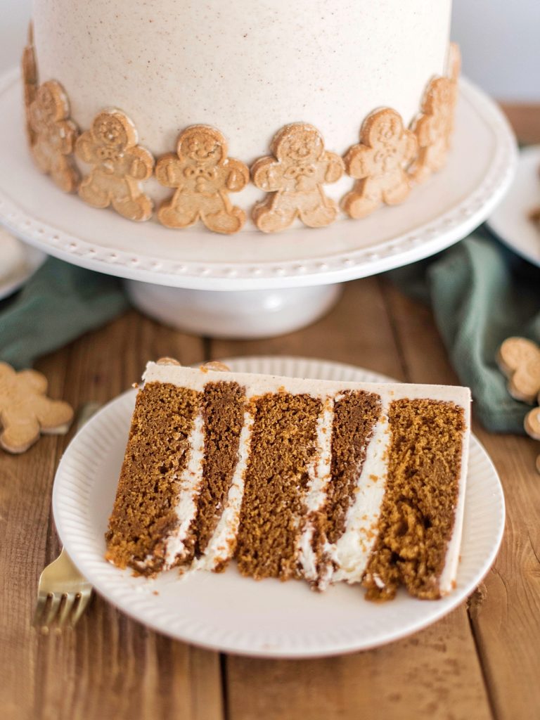 Gingerbread Cookie Cake - gingerbread cake layers with boiled milk frosting, gingersnap cookies and gingersnap buttercream. #gingerbread #gingersnap #boiledmilkfrosting #christmascake #bestchristmascakes #bestholidaycakes #holidaycakes #bestholidaydesserts #holidaydessertideas #holidaycakerecipe #christmascakerecipes #gingerbreadcake #gingersnapcookie