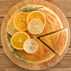 Citrus Olive Oil Cake - tender and moist ricotta olive oil cake layers with lemon and orange zests. #holidaycake #oliveoilcake #holidaycakerecipes #christmascake #bestchristmascakes #bestchristmasdesserts #holidaydessertideas #christmascakeideas #christmascakerecipe #oliveoilcakerecipe
