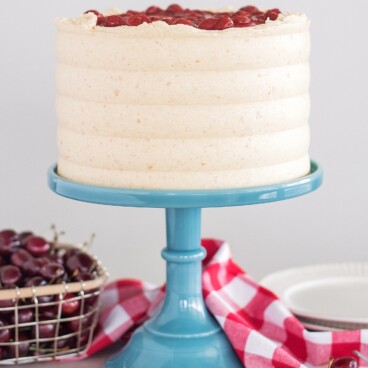 Cherry Cheese Pie Cake - dig into this delicious pie-inspired cake with layers of graham cracker, cream cheese cake, cheesecake filling, cherry pie filling and graham cracker buttercream. #cakebycourtney #cherrycheesepiecake #cherrypie #cherrycheesepie #bestsummercakerecipes #summercakerecipe #bestcakerecipes #summercakes #cherrypiecake #cherrydessert #summerdessert #howtomakebuttercreamfrosting #howtomakecake