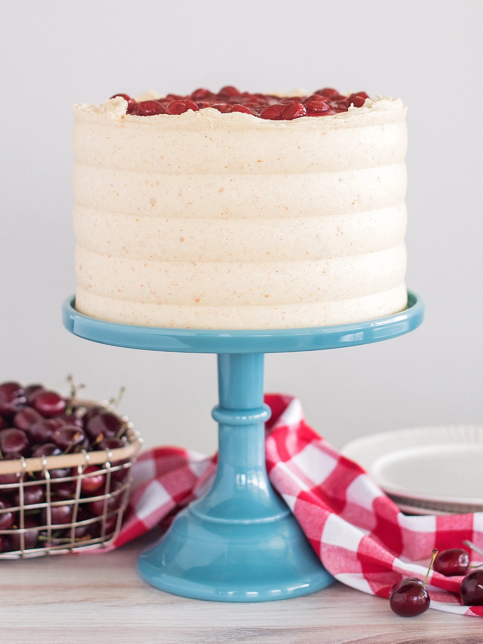 Cherry Cheese Pie Cake - dig into this delicious pie-inspired cake with layers of graham cracker, cream cheese cake, cheesecake filling, cherry pie filling and graham cracker buttercream.  #cakebycourtney #cherrycheesepiecake #cherrypie #cherrycheesepie #bestsummercakerecipes #summercakerecipe #bestcakerecipes #summercakes #cherrypiecake #cherrydessert #summerdessert #howtomakebuttercreamfrosting #howtomakecake 