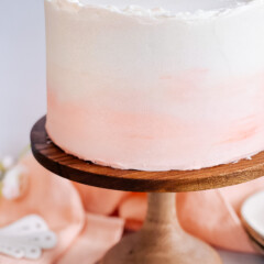 Ombre peach cake on cake stand
