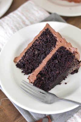 The Most Delicious Chocolate Cake - rich, moist and decadent chocolate cake layers with silky smooth chocolate buttercream #chocolatecake #bestchocolatecake #favoritechocolatecake #easychocolatecake #easychocolatecakerecipe #chocolatecakerecipe #chocolate #chocolateicing #icingrecipe #frostingrecipe #chocolatefrosting #chocolatefrostingrecipe #chocolatecakeeasy #howtomakecake #howtomakechocolatecake #birthdaycake #howtomakebuttercreamfrosting