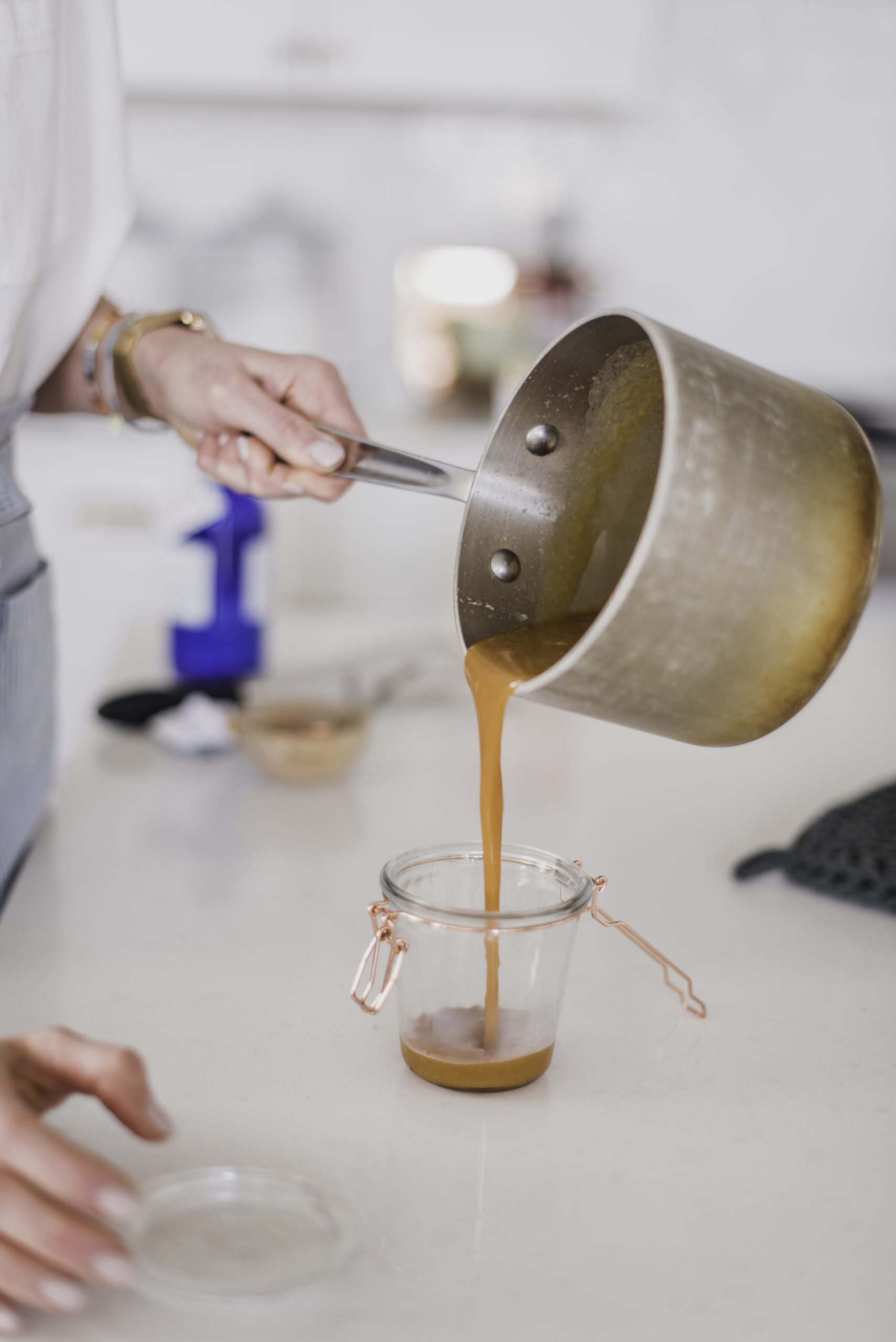 Homemade Salted Caramel being poured into a glass.