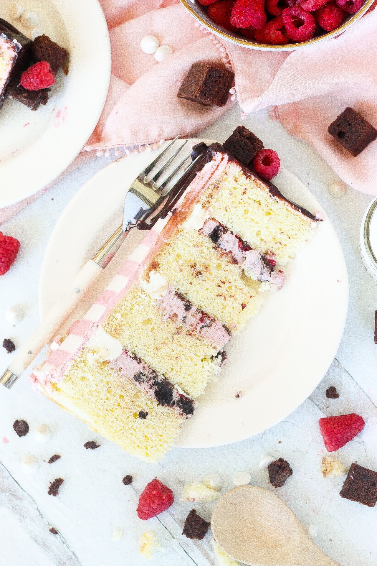 White Chocolate Raspberry Brownie Cake with raspberry layers.