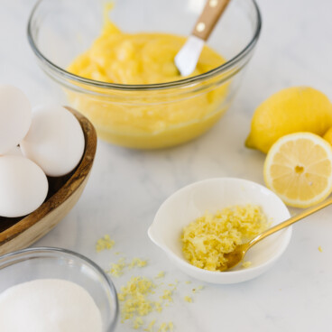 Ingredients to make lemon curd on a counter.