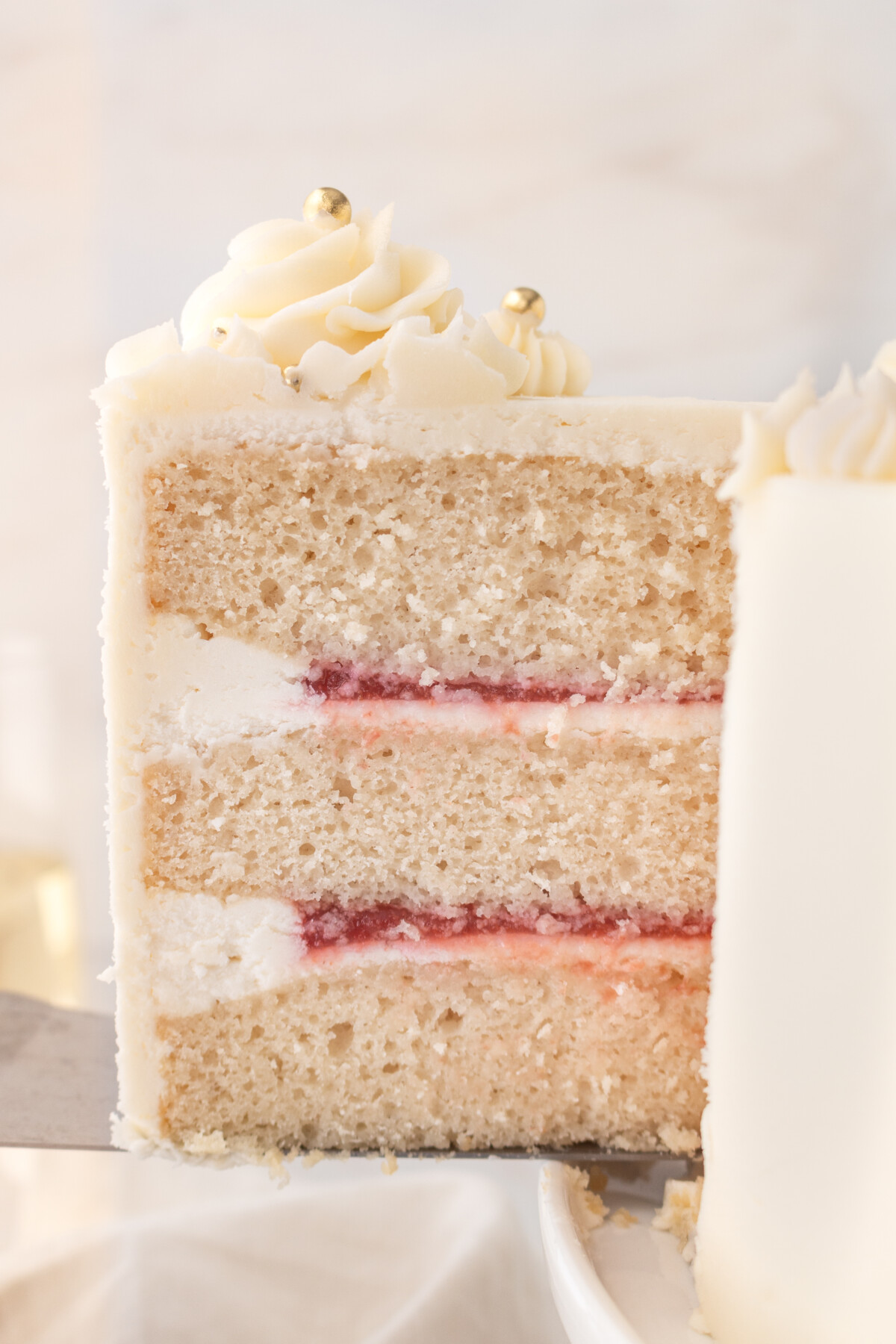 A cake with slices cut out of it so you can see the center.