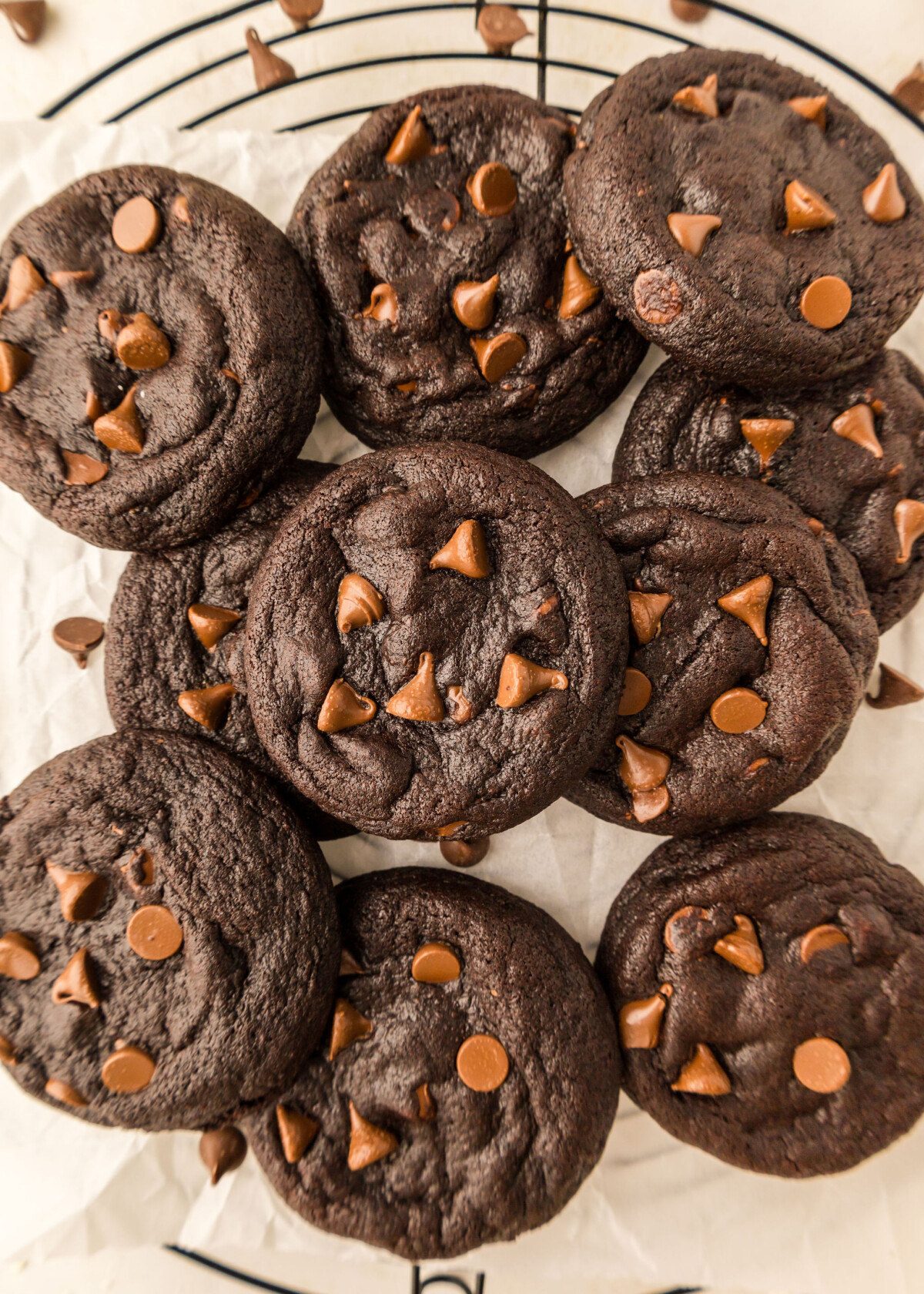 Chocolate cookies on a cooling rack.