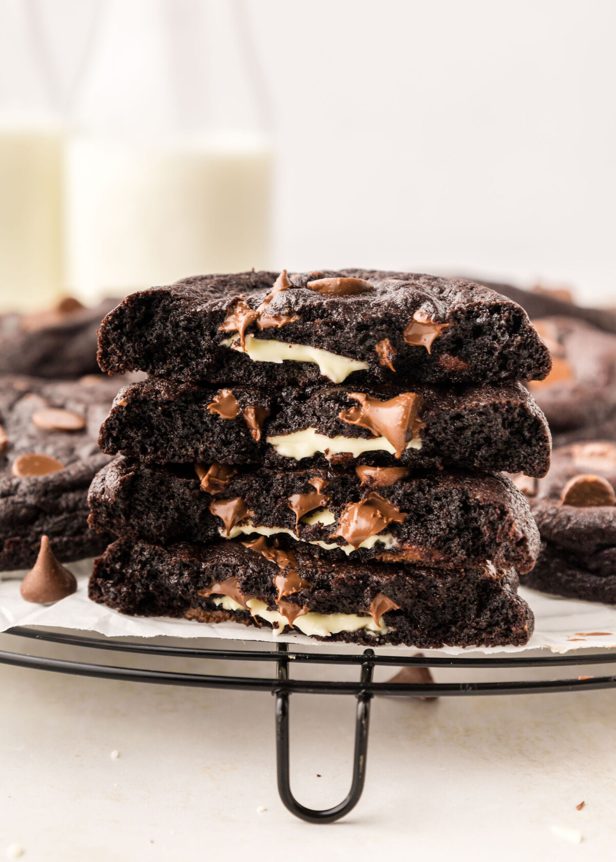 Stack of chocolate cookies with milk.