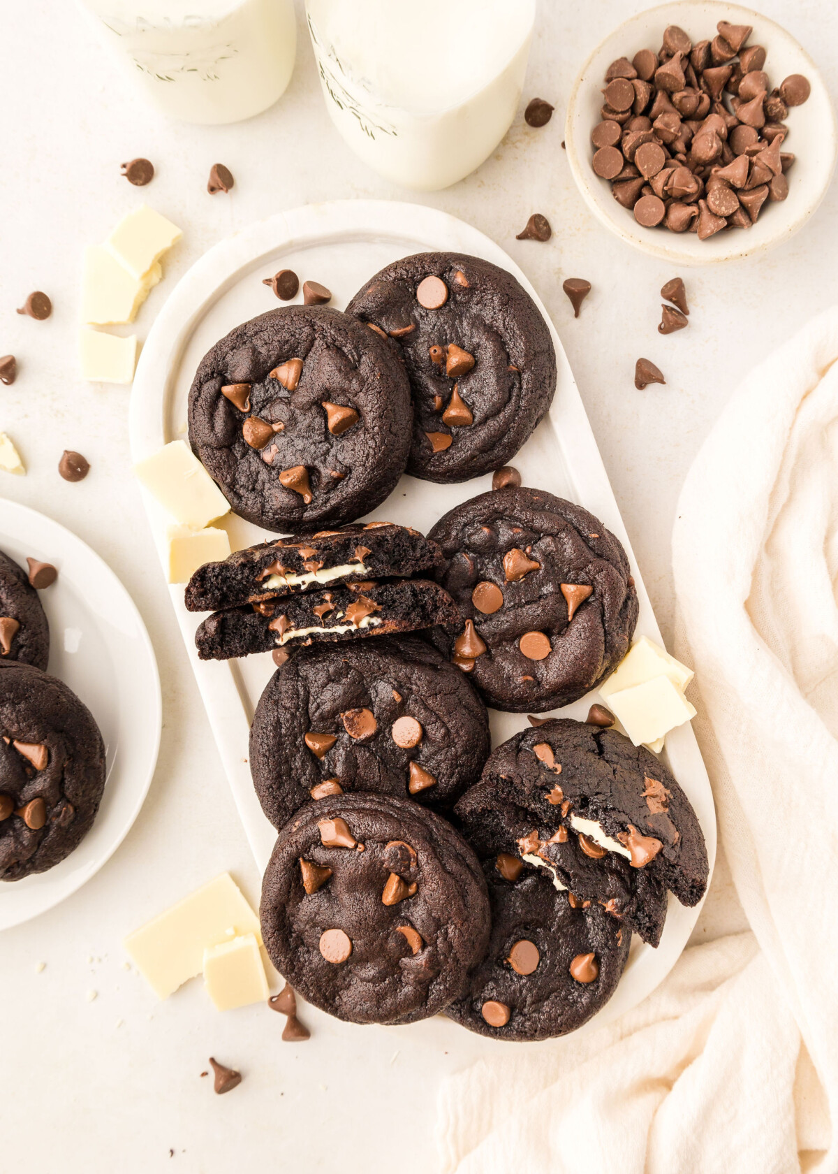 Cookies on a plate with milk.