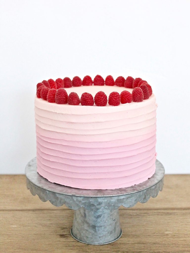 pink velvet cake with raspberry buttercream. The best light and fluffy cakes to make this spring. www.cakebycourtney.com