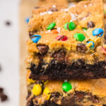 A stack of Monster Brookie Bars on a cutting board.