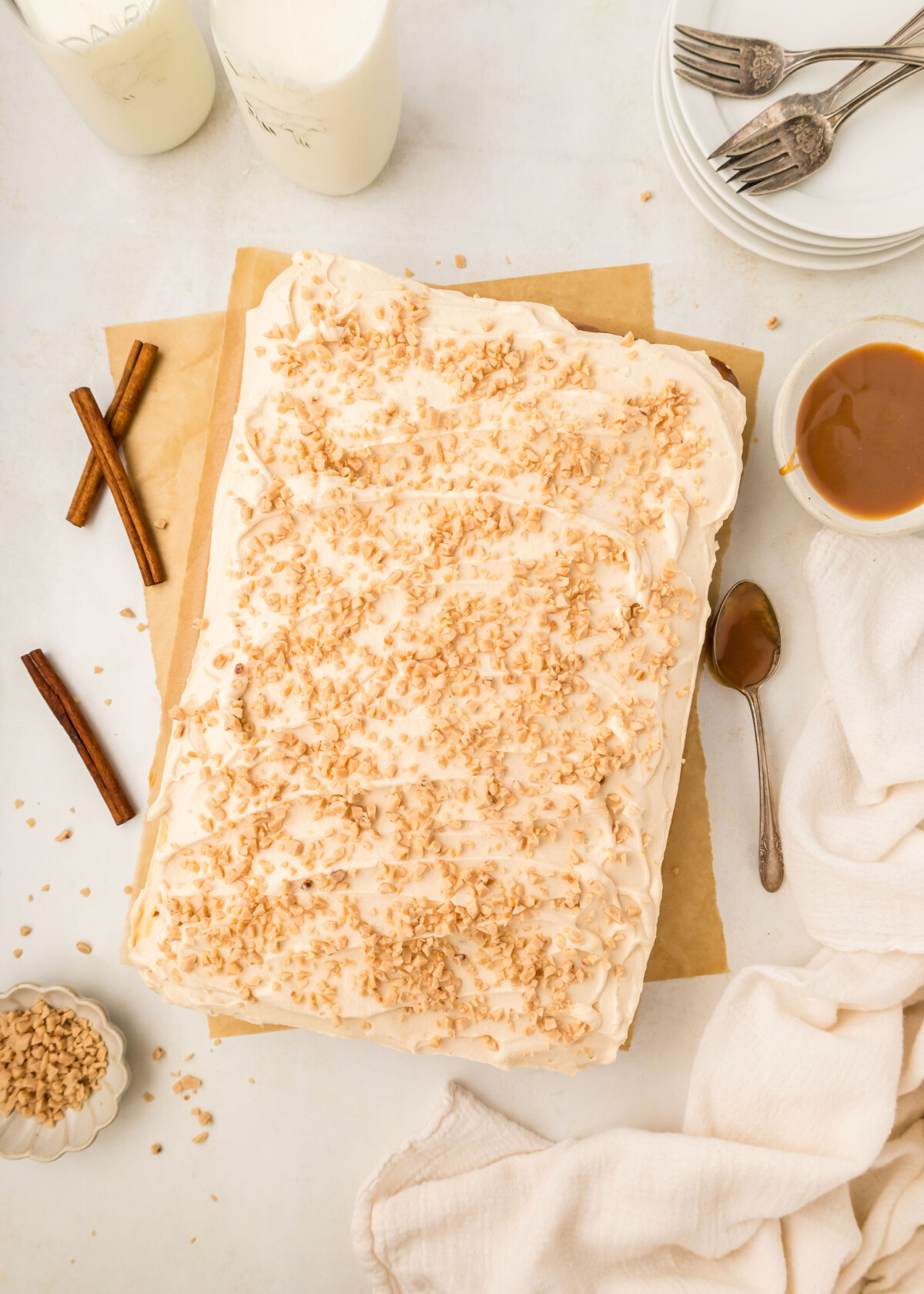 A sheet cake on a cutting board.