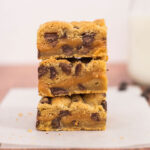 Stack of chocolate chip caramel bars.