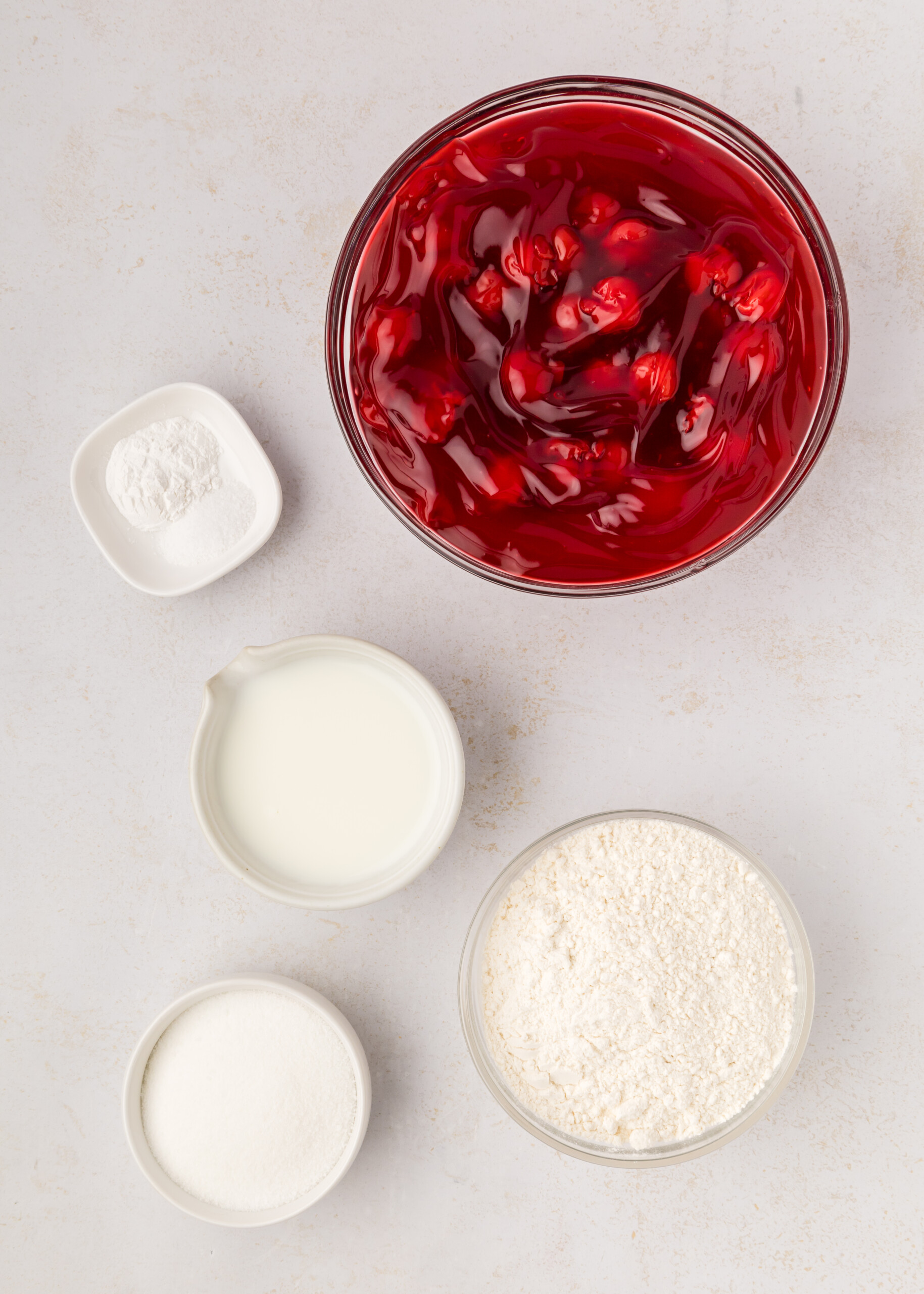 Ingredients to make cherry cobbler.