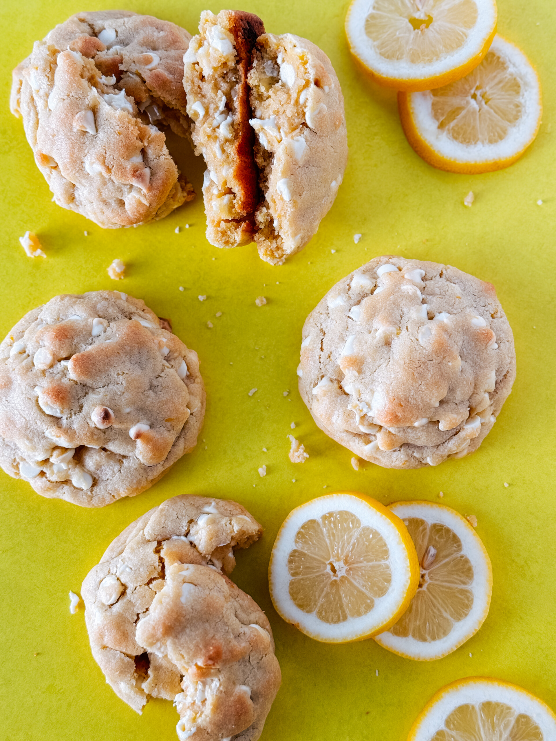 Lemon cookies on a yellow backdrop.