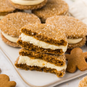 Gingerbread sandwich cookies split in half.