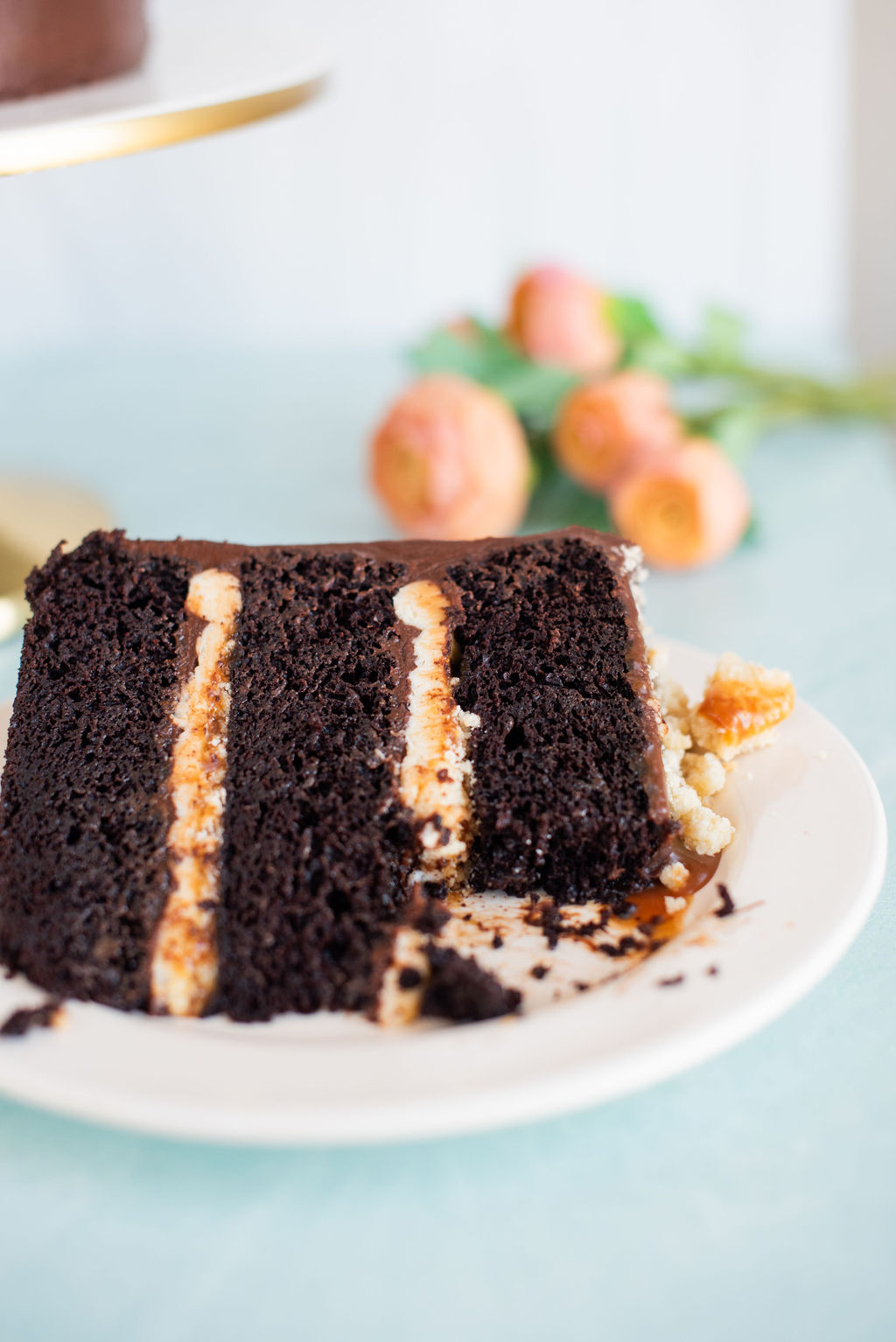 A slice of cake with a bite take out of it.