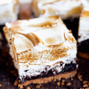 A slice of S'mores Brownie with toasted marshmallow fluff.