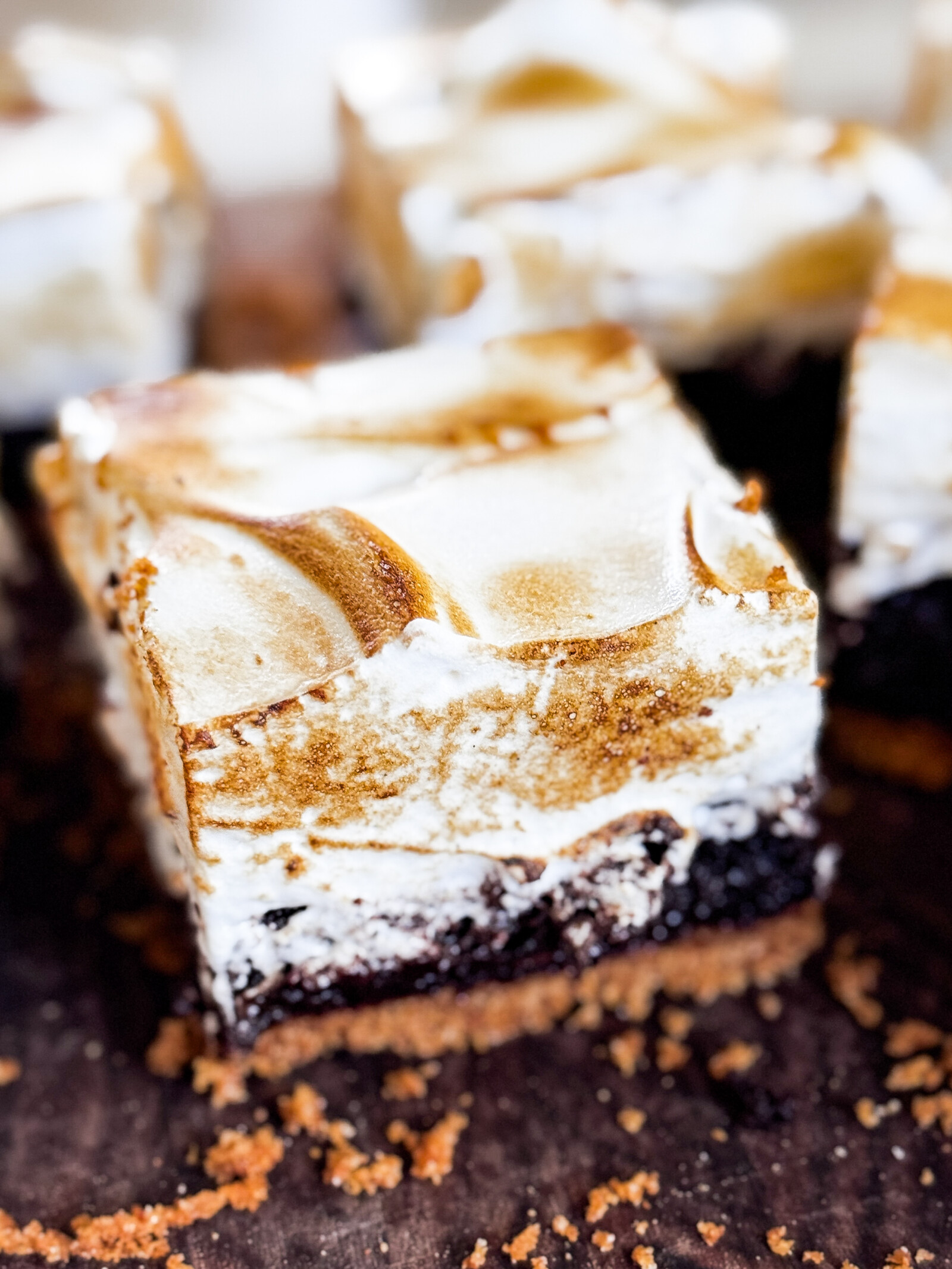 A slice of S'mores Brownie with toasted marshmallow fluff.